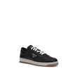 Black Calf Leather Bos Taurus Low Top SneakersPrada’s Downtown leather Sneakers combine sporty lines and iconic details in a refined design. Featuring a paneled construction, they feature a lace-up front closure, perforated round toe and flat sole. The ic