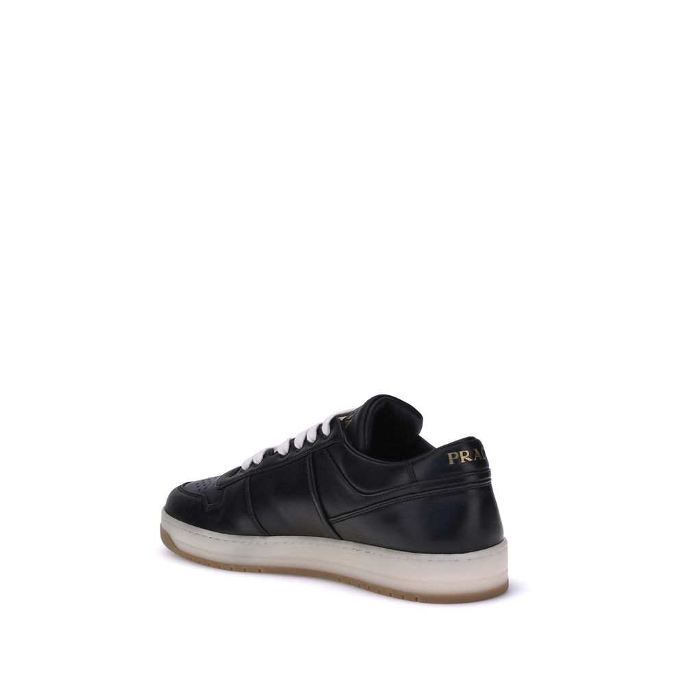 Black Calf Leather Bos Taurus Low Top SneakersPrada’s Downtown leather Sneakers combine sporty lines and iconic details in a refined design. Featuring a paneled construction, they feature a lace-up front closure, perforated round toe and flat sole. The ic