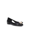 Black Rubber Ballet FlatsFerragamo’s Rubber Ballerina combines elegance and practicality with a sleek, modern design. The low block heel ensures comfort, while the side cut-out details lend lightness to the silhouette. The metallic logo bow on the front a