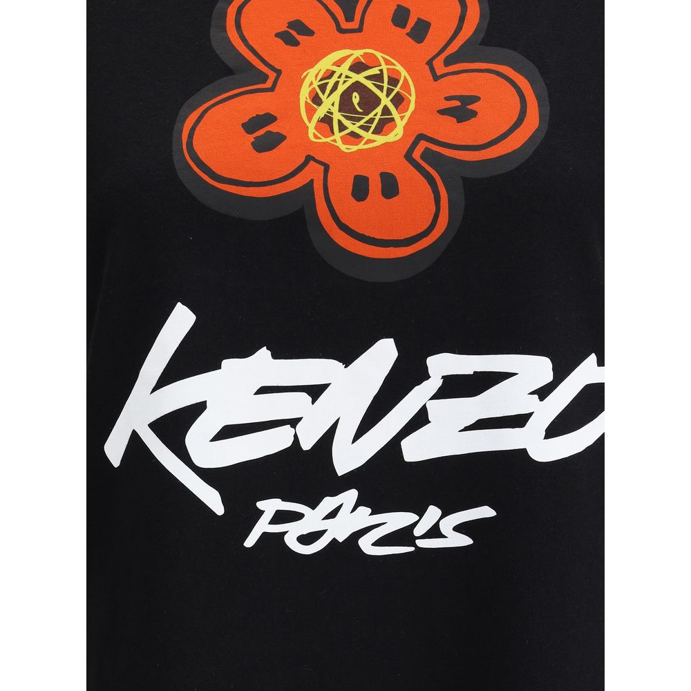 Black Cotton T-ShirtKenzo’s Futura T-Shirt is an iconic garment that combines simplicity and visual identity. Made of soft cotton, it features a ribbed crew neck and an essential fit. On the front, the iconic Kenzo signature and the house’s iconic flower