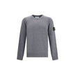 Gray Wool SweatshirtWool Sweater by Stone Island featuring a ribbed crew neck, a logo patch applied to the left sleeve and ribbed trim at the cuffs and hem. The monochrome design enhances the clean lines of the garment, perfect for a casual yet polished l