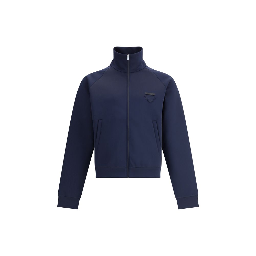Blue Polyester SweatshirtContemporary style Sweatshirt by Prada, made with a high collar and front zipper closure. Raglan sleeves ensure comfort and freedom of movement, while the two side welt pockets offer practicality and a functional touch. The design