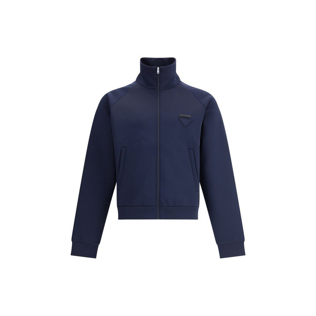 Blue Polyester SweatshirtContemporary style Sweatshirt by Prada, made with a high collar and front zipper closure. Raglan sleeves ensure comfort and freedom of movement, while the two side welt pockets offer practicality and a functional touch. The design