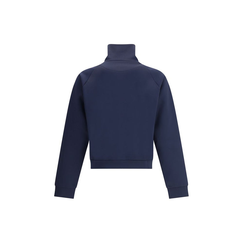 Blue Polyester SweatshirtContemporary style Sweatshirt by Prada, made with a high collar and front zipper closure. Raglan sleeves ensure comfort and freedom of movement, while the two side welt pockets offer practicality and a functional touch. The design