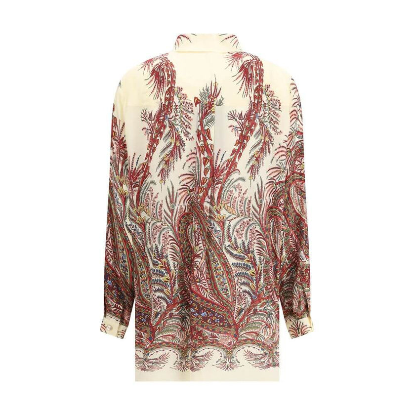 Multicolor Silk Pattern ShirtThe Etro Shirt is made of pure silk crêpe de Chine and stands out for its long and straight design, embellished with a placed floral Paisley print, emblem of the iconic style of the maison. The regular fit ensures comfort and