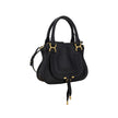 Marcie HandbagCalfskin Marcie Handbag by Chloé, double rigid leather top handle, removable and adjustable leather shoulder strap, top zipper closure, front flap with iconic leather tassel detail, iconic brand monogram press-stamped on front, open front po