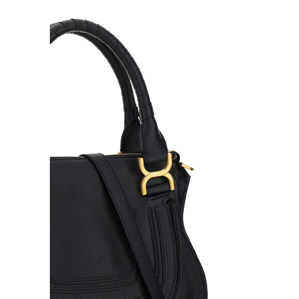 Marcie HandbagCalfskin Marcie Handbag by Chloé, double rigid leather top handle, removable and adjustable leather shoulder strap, top zipper closure, front flap with iconic leather tassel detail, iconic brand monogram press-stamped on front, open front po
