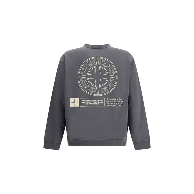 Logo SweatshirtThe Stone Island Logo Sweatshirt features a ribbed collar and ribbed cuffs and bottom band for a comfortable and defined fit. A small Stone Island logo printed in the center of the chest stands out on the front, while the famous Stone Islan