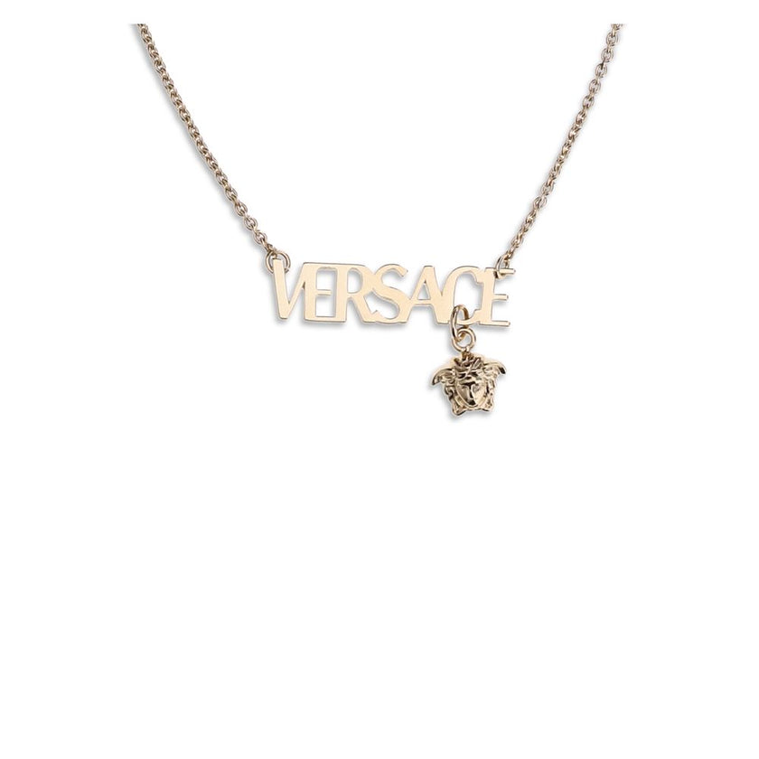 Gold Metal NecklaceThe Versace Logo Necklace is a thin and refined jewel, composed of a delicate chain on which the Versace writing stands out and a small Medusa pendant, the iconic symbol of the fashion house. Made with hypoallergenic materials, free of