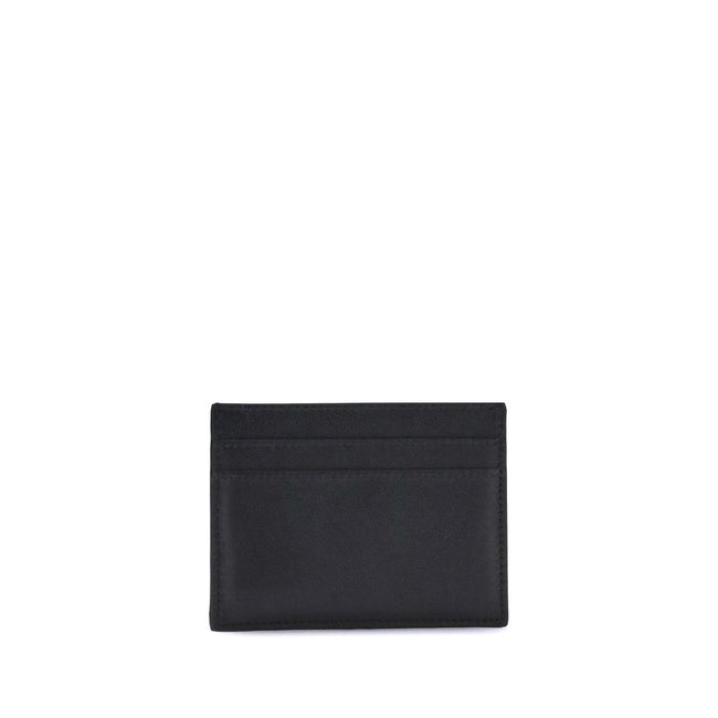 Black Calf Leather Bos Taurus WalletBalenciaga’s Monaco Card Holder combines practicality with sophisticated style. It features an inside pocket, two slots on the front and two on the back to conveniently organize cards. The gold logo plaque on the front