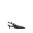 Black Calf Leather Bos Taurus PumpsThe Gancini slingback Pumps by Ferragamo combine classic elegance and iconic details. The softly rounded neckline enhances the silhouette of the foot, giving it a harmonious and feminine line. The famous Gancini ornament