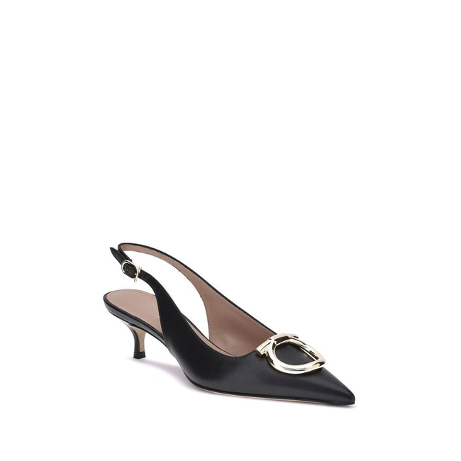 Black Calf Leather Bos Taurus PumpsThe Gancini slingback Pumps by Ferragamo combine classic elegance and iconic details. The softly rounded neckline enhances the silhouette of the foot, giving it a harmonious and feminine line. The famous Gancini ornament