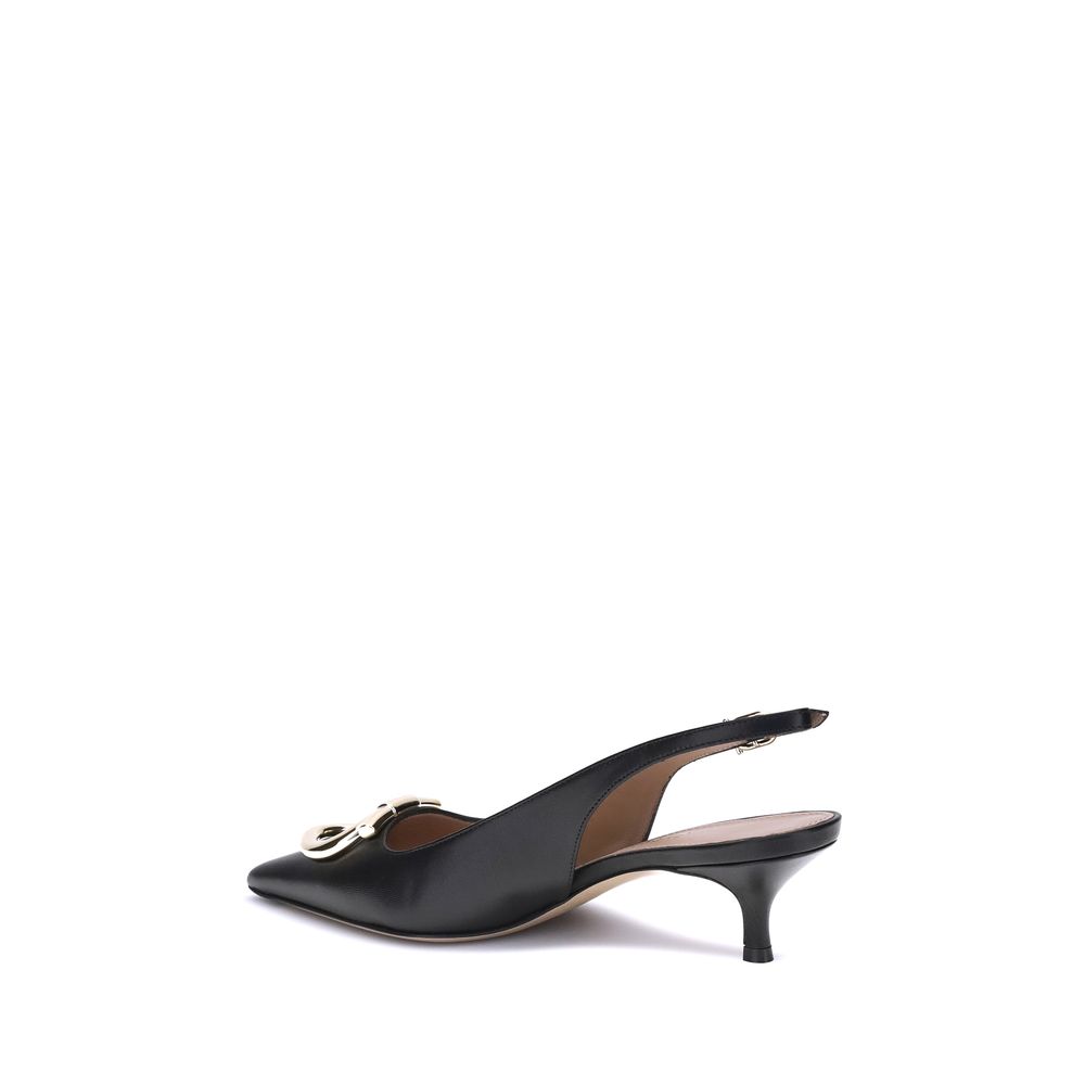 Black Calf Leather Bos Taurus PumpsThe Gancini slingback Pumps by Ferragamo combine classic elegance and iconic details. The softly rounded neckline enhances the silhouette of the foot, giving it a harmonious and feminine line. The famous Gancini ornament