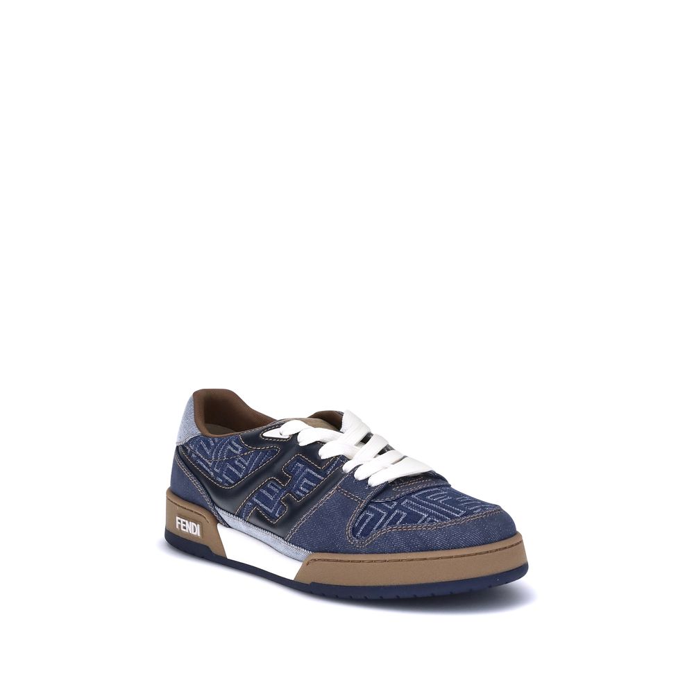 Blue Cotton Low Top SneakersFendi’s lace-up Sneakers combine urban style and iconic details. Crafted from blue denim-effect FF jacquard, they are enriched with contrasting leather-colored stitching and a padded dark blue leather FF appliqué on the side. C