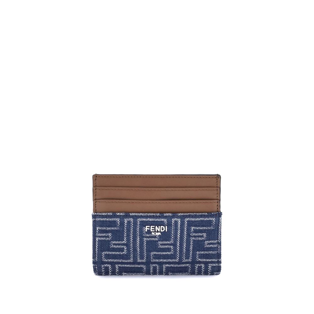 Blue Fabric WalletThe Fendi Embroidered denim Card Holder combines functionality and iconic style in a compact and sophisticated accessory. Crafted from denim with an all-over FF embroidery, it is embellished with the logo in metal letters on the front. I