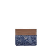 Blue Fabric WalletThe Fendi Embroidered denim Card Holder combines functionality and iconic style in a compact and sophisticated accessory. Crafted from denim with an all-over FF embroidery, it is embellished with the logo in metal letters on the front. I