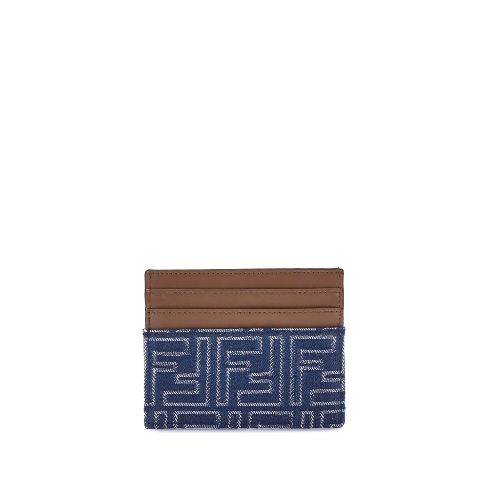 Blue Fabric WalletThe Fendi Embroidered denim Card Holder combines functionality and iconic style in a compact and sophisticated accessory. Crafted from denim with an all-over FF embroidery, it is embellished with the logo in metal letters on the front. I