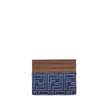 Blue Fabric WalletThe Fendi Embroidered denim Card Holder combines functionality and iconic style in a compact and sophisticated accessory. Crafted from denim with an all-over FF embroidery, it is embellished with the logo in metal letters on the front. I
