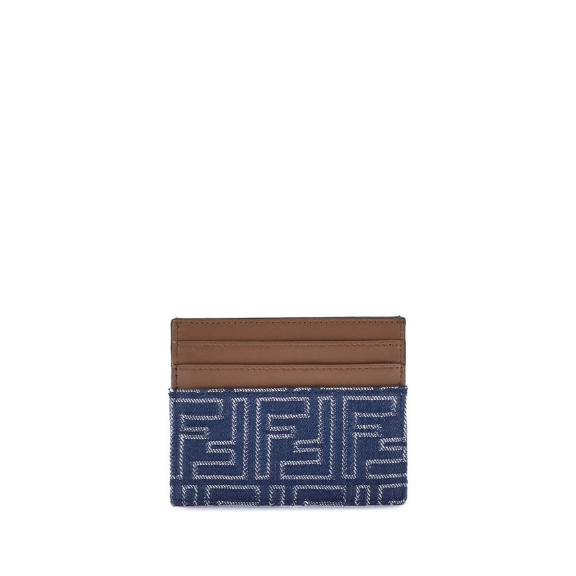 Blue Fabric WalletThe Fendi Embroidered denim Card Holder combines functionality and iconic style in a compact and sophisticated accessory. Crafted from denim with an all-over FF embroidery, it is embellished with the logo in metal letters on the front. I