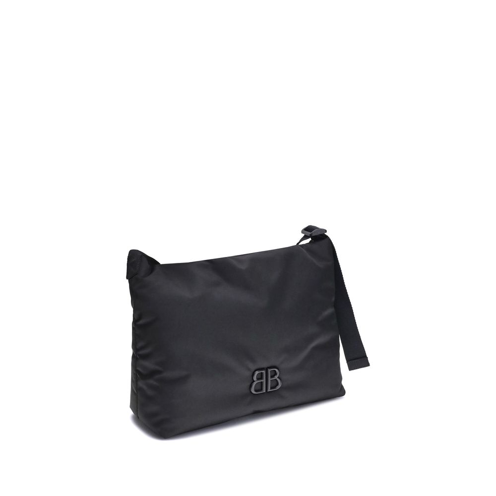 Black Fabric Shoulder BagFabric Shoulder Bag by Balenciaga with a contemporary and versatile design, ideal for everyday use. The flat shoulder strap ensures comfort and practicality, while the BB logoed magnetic flap closure adds a distinctive and prestig