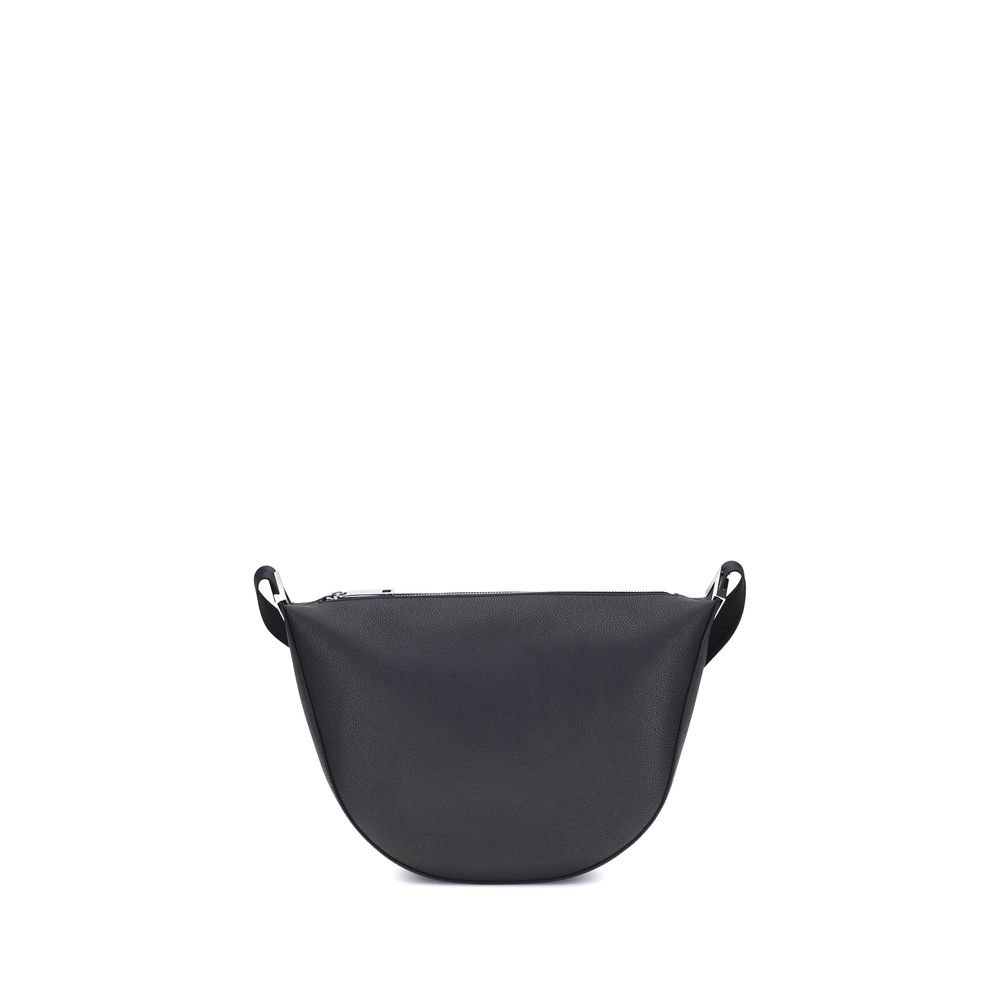 Black Calf Leather Bos Taurus Shoulder BagThe Fendi Melon Shoulder Bag, in the medium size, stands out for its elegant half-moon shape. Crafted from black grained leather, it is embellished with metal FF appliques on the corners and palladium-finish acces