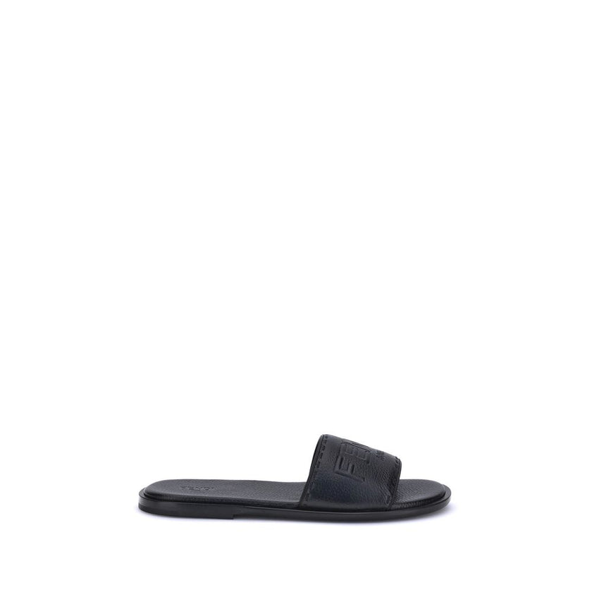 Black Calf Leather Bos Taurus Flat SandalsFendi Sandals stand out for their essential design and high craftsmanship. Featuring a high band, they are made of black grained leather and finished with hand-made tone-on-tone Selleria macro stitching, which com