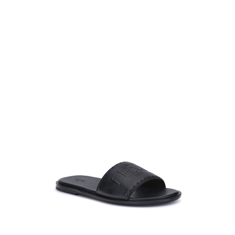 Black Calf Leather Bos Taurus Flat SandalsFendi Sandals stand out for their essential design and high craftsmanship. Featuring a high band, they are made of black grained leather and finished with hand-made tone-on-tone Selleria macro stitching, which com