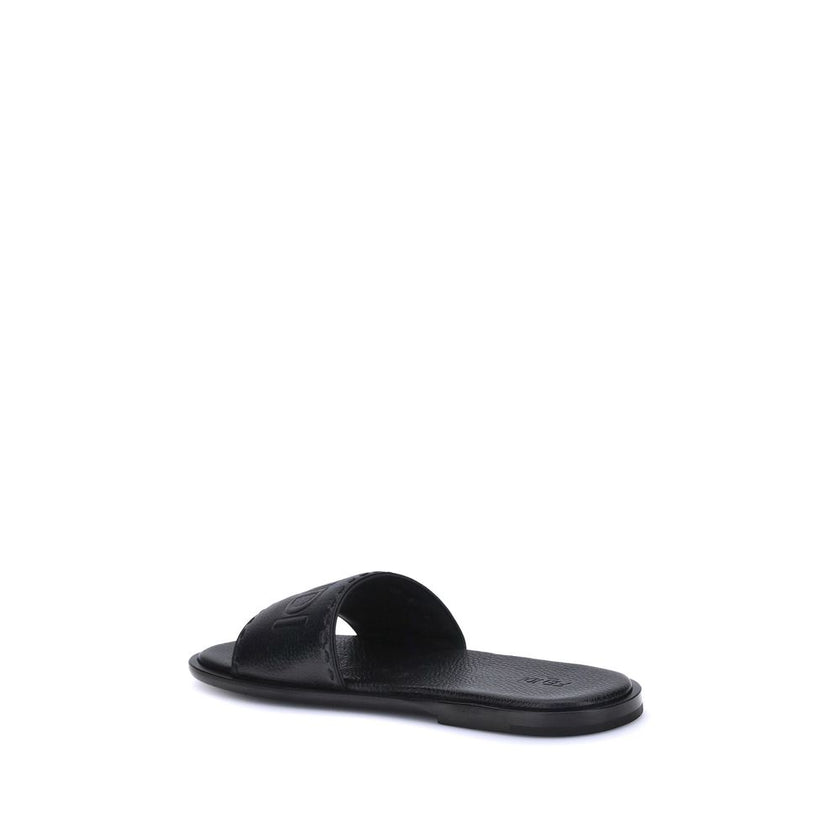 Black Calf Leather Bos Taurus Flat SandalsFendi Sandals stand out for their essential design and high craftsmanship. Featuring a high band, they are made of black grained leather and finished with hand-made tone-on-tone Selleria macro stitching, which com