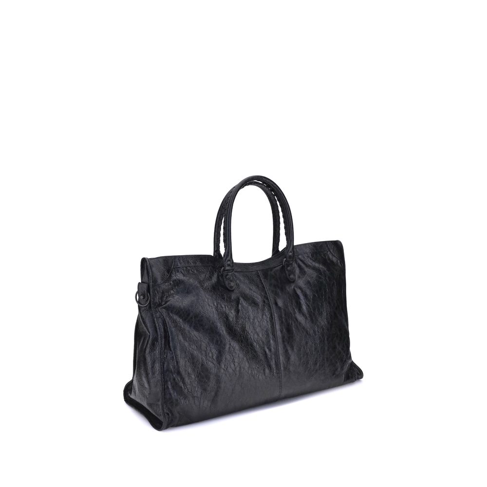 Black Calf Leather Bos Taurus Shoulder BagBalenciaga’s Le City Travel Bag is a high-class item made of fine lambskin leather that combines elegance and functionality. The two hand-woven leather handles lend a handcrafted and refined touch, while the adjus