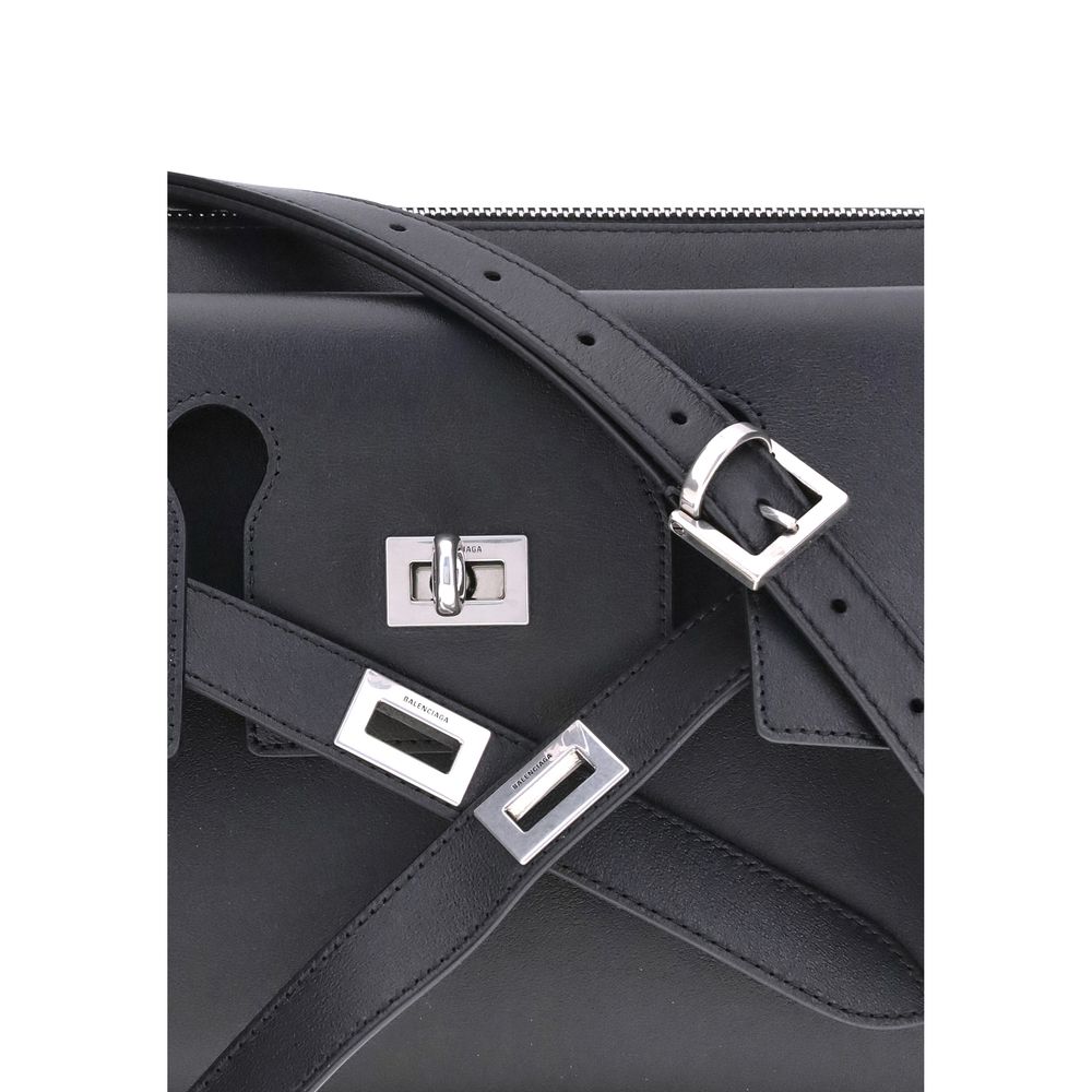 Black Calf Leather Bos Taurus Shoulder BagBalenciaga’s Bel Air small Shoulder Bag combines functionality and contemporary style in a compact and versatile design, perfect for carrying on the shoulder or cross-body. Crafted with thoughtful details, it feat