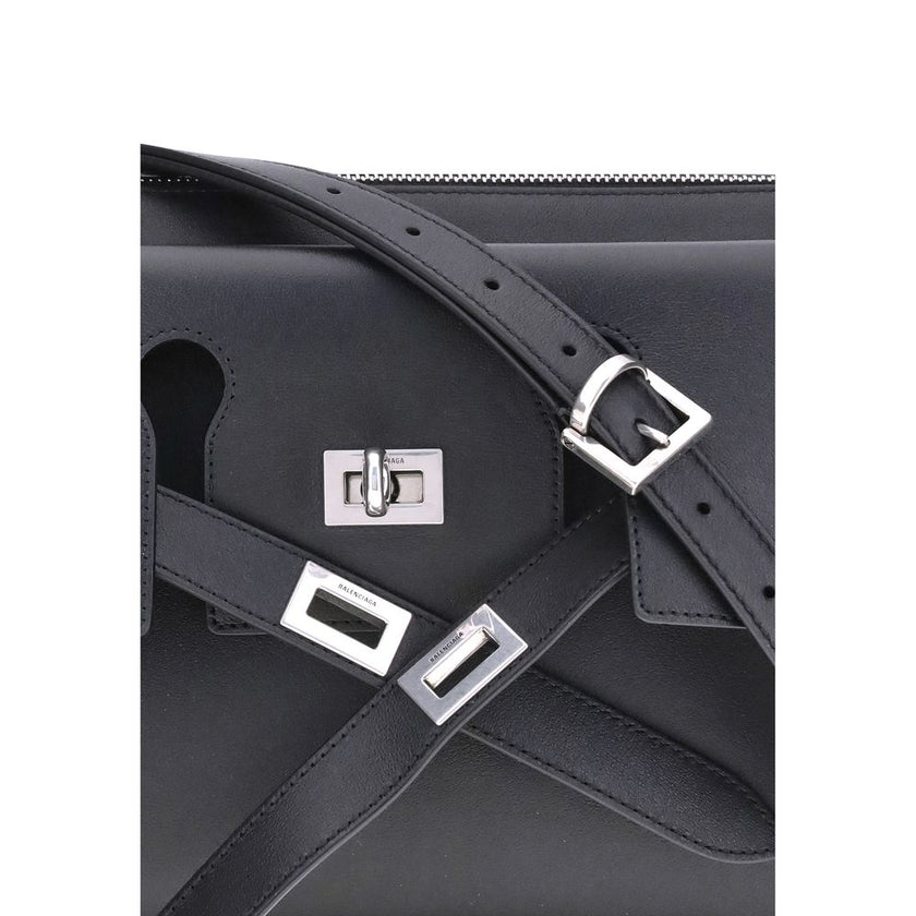 Black Calf Leather Bos Taurus Shoulder BagBalenciaga’s Bel Air small Shoulder Bag combines functionality and contemporary style in a compact and versatile design, perfect for carrying on the shoulder or cross-body. Crafted with thoughtful details, it feat