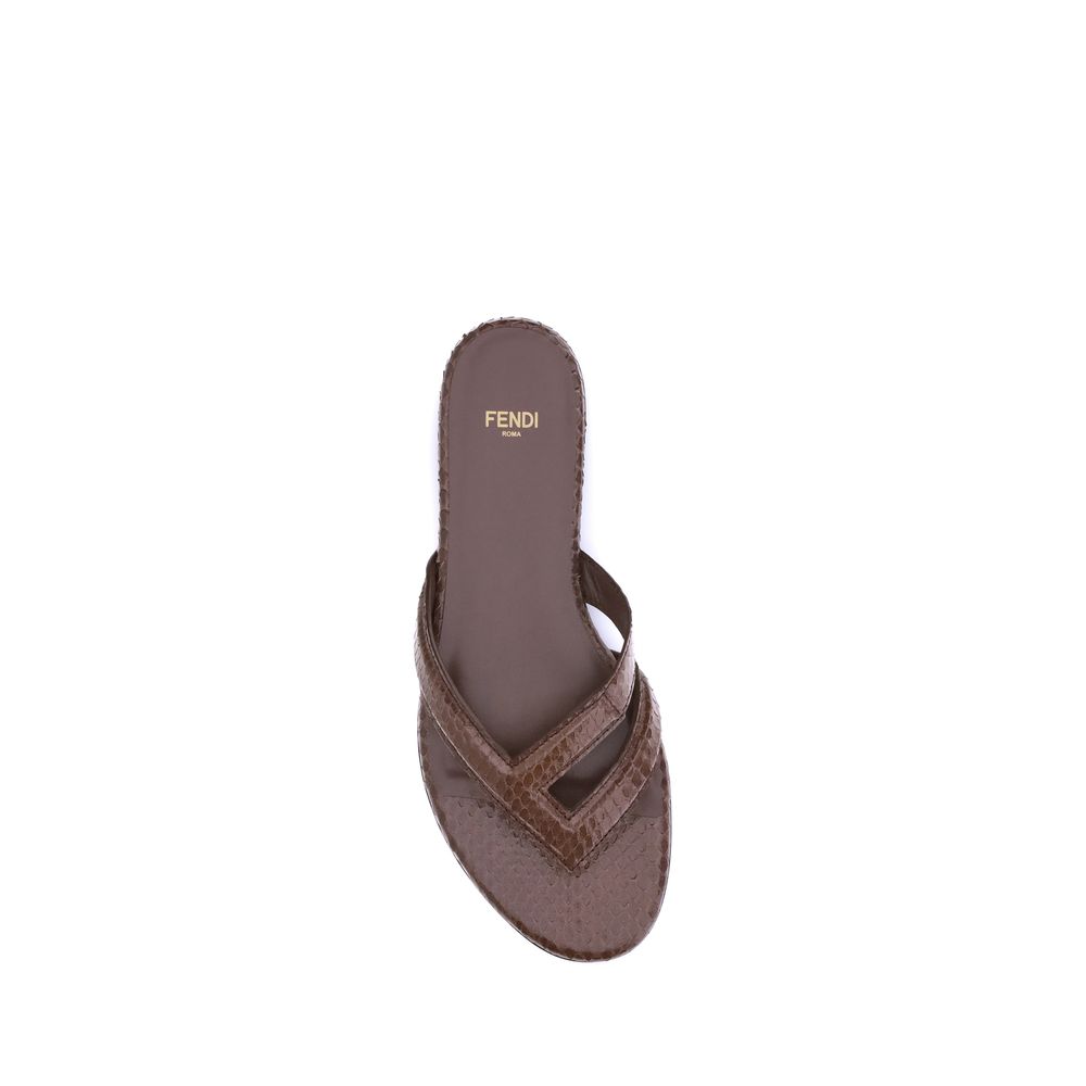 Infradito Ayers SandalsThe Ayers flip-flop Sandals by Fendi are distinguished by thin straps that form an elegant F motif. Crafted from fine dark brown Ayers leather, they are complemented by a leather insole in the same shade, combining refined style and