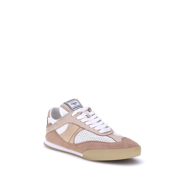 Beige Calf Leather Bos Taurus Low Top SneakersChloé’s Kick Sneakers are a perfect blend of modern style and comfort, ideal for a dynamic, casual-chic look. Made of mesh, smooth leather and suede, these sneakers offer a combination of textures that enrich