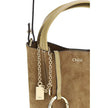 Beige Calf Leather Bos Taurus Shoulder BagThe Spin Handbag by Chloé, crafted from soft suede, stands out for its minimalist silhouette defined by clean graphic lines. A pendant chain with the Chloé and Horse medals, iconic symbols of the Maison, adds a re