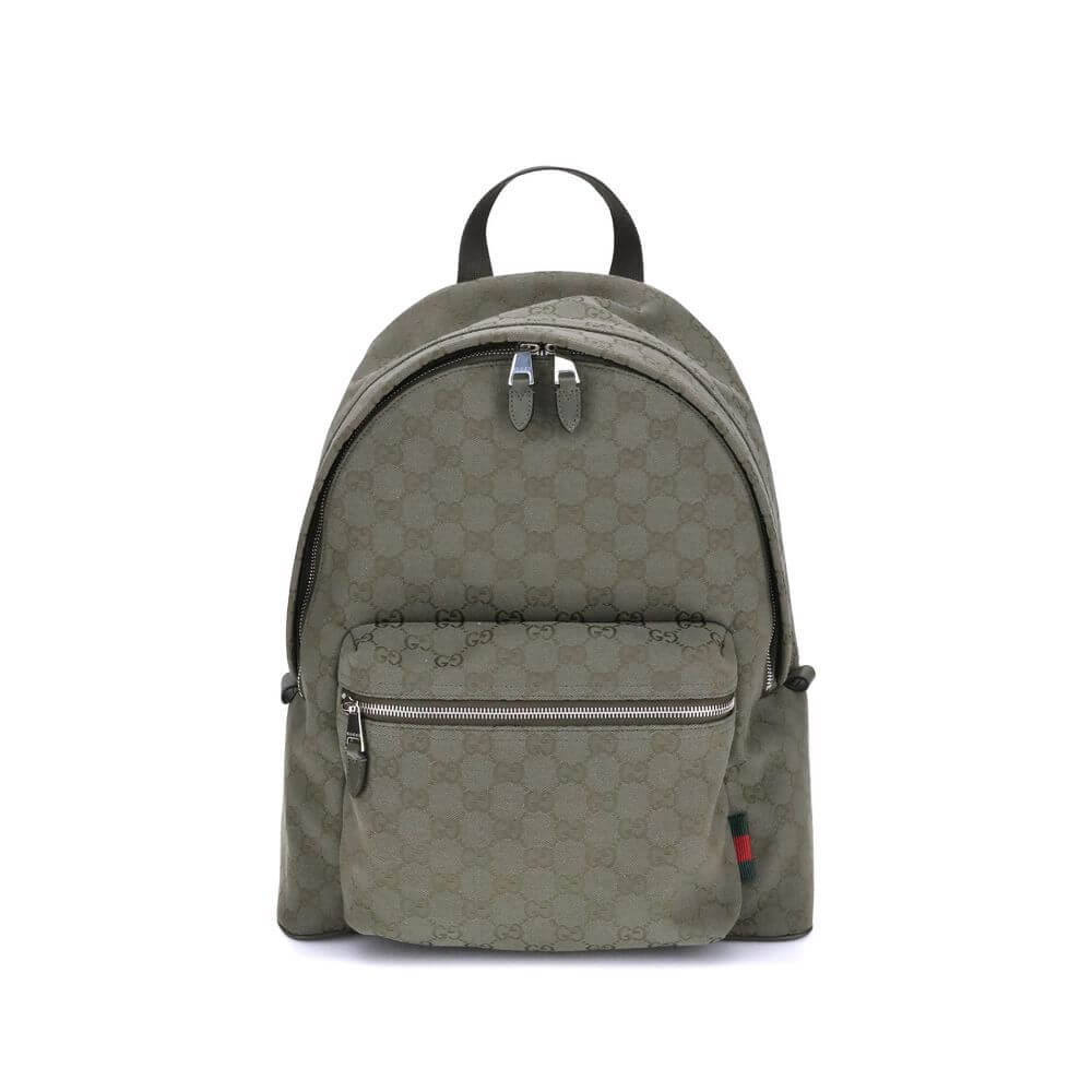 Green Cotton BackpackGucci’s Medium GG fabric Backpack is a functional and distinctive accessory. Made of the iconic forest green GG fabric, it is enhanced by elegant leather trim in the same color. The famous green and red Web detail adds a sporty and in