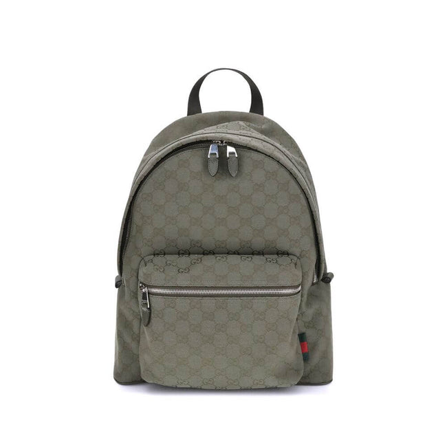 Green Cotton BackpackGucci’s Medium GG fabric Backpack is a functional and distinctive accessory. Made of the iconic forest green GG fabric, it is enhanced by elegant leather trim in the same color. The famous green and red Web detail adds a sporty and in