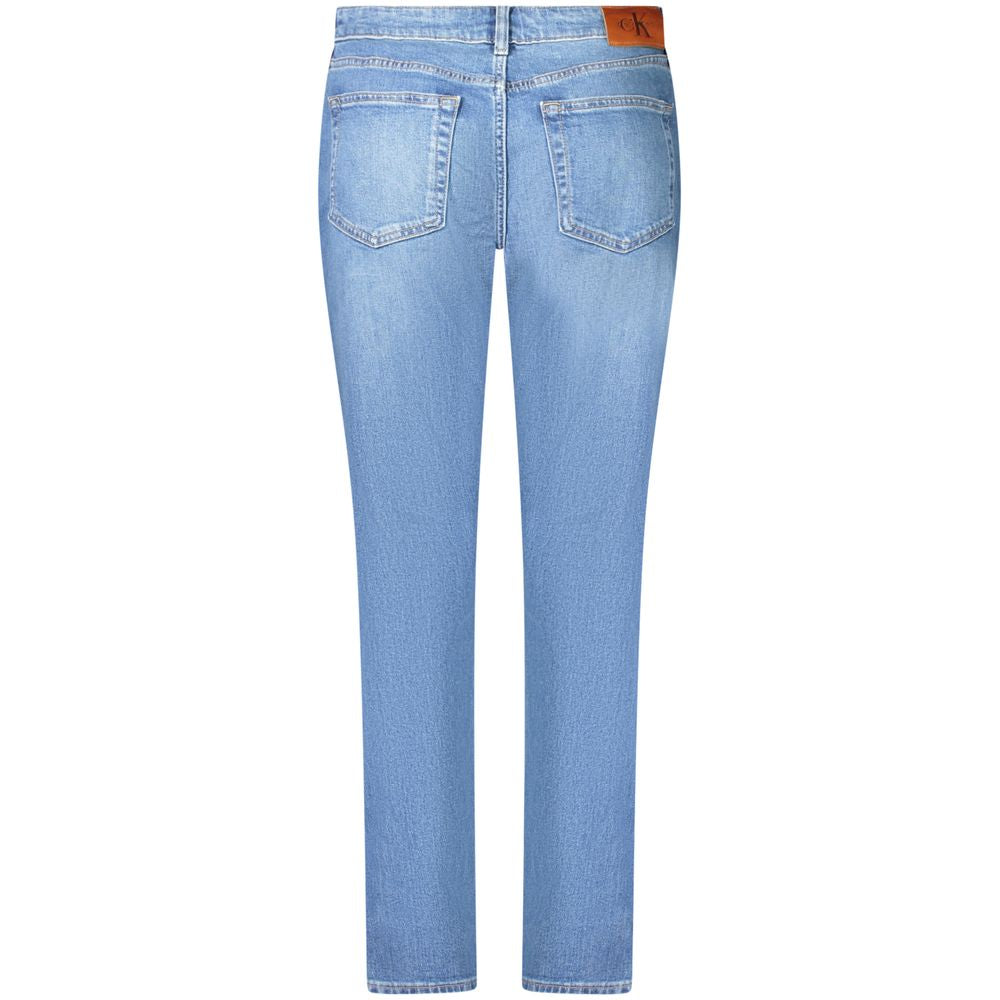 Blue Cotton Women's Slim JeanElevate your wardrobe with the timelessly chic Calvin Klein Mid Rise Slim Jeans. Designed for those who dare to stand out while appreciating the comfort of classic denim, these jeans feature a figure-flattering slim fit and a