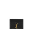 Black Calf Leather Bos Taurus CardholderCalfskin Card Holder by Saint Laurent, quilted matelassé design, front plaque with iconic three-dimensional YSL logo, card slots on front and back, bill compartment on top. Season: AW25 Dimension: 10.5×10.5 Composit
