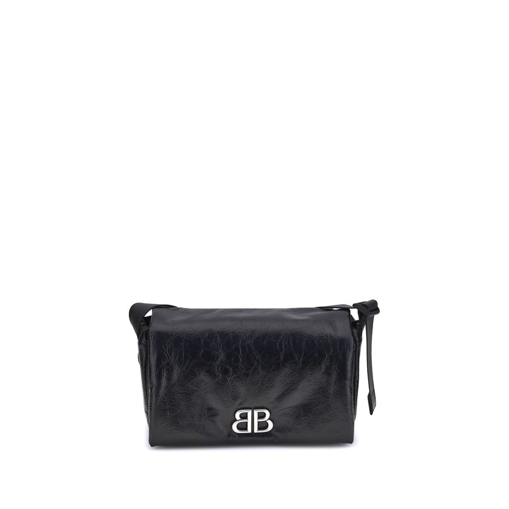 Black Calf Leather Bos Taurus Shoulder BagBalenciaga’s Monaco Shoulder Bag combines clean lines and refined details in an essential and sophisticated design. Crafted in grained-textured leather, it features a top flap with magnetic closure for practicalit
