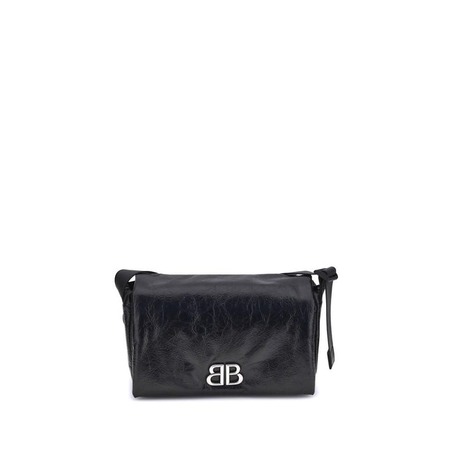 Black Calf Leather Bos Taurus Shoulder BagBalenciaga’s Monaco Shoulder Bag combines clean lines and refined details in an essential and sophisticated design. Crafted in grained-textured leather, it features a top flap with magnetic closure for practicalit