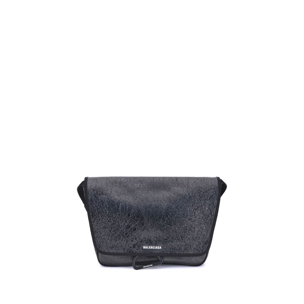 Black Calf Leather Bos Taurus Shoulder BagBalenciaga’s Explorer Shoulder Bag is a practical accessory with an urban style. Crafted from supple Arena lambskin, it features an adjustable shoulder strap and matte black finishes. The embossed and printed Bale