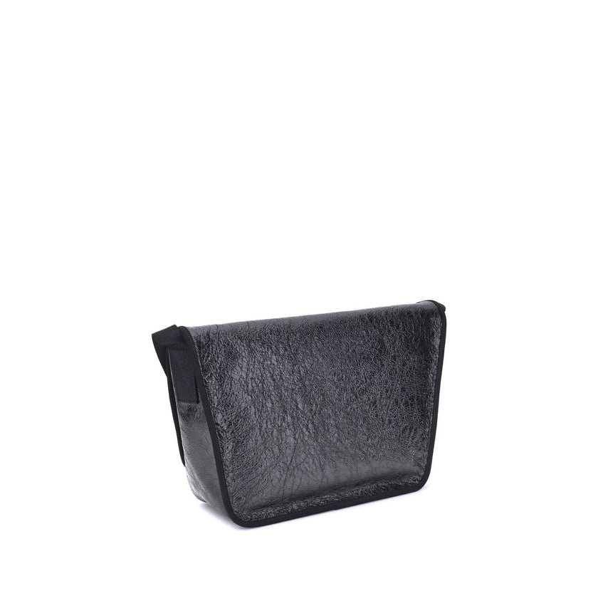 Black Calf Leather Bos Taurus Shoulder BagBalenciaga’s Explorer Shoulder Bag is a practical accessory with an urban style. Crafted from supple Arena lambskin, it features an adjustable shoulder strap and matte black finishes. The embossed and printed Bale