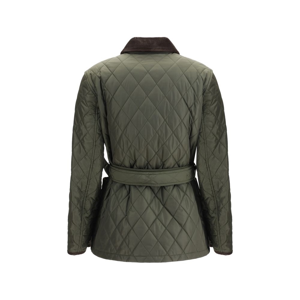 Green Polyamide CoatThe Burberry quilted Jacket is crafted from lightweight Italian-woven nylon, combining functionality with refined style. Featuring a zip and press stud fastening, it is finished with a flattering B-buckle belt. Side patch pockets add p