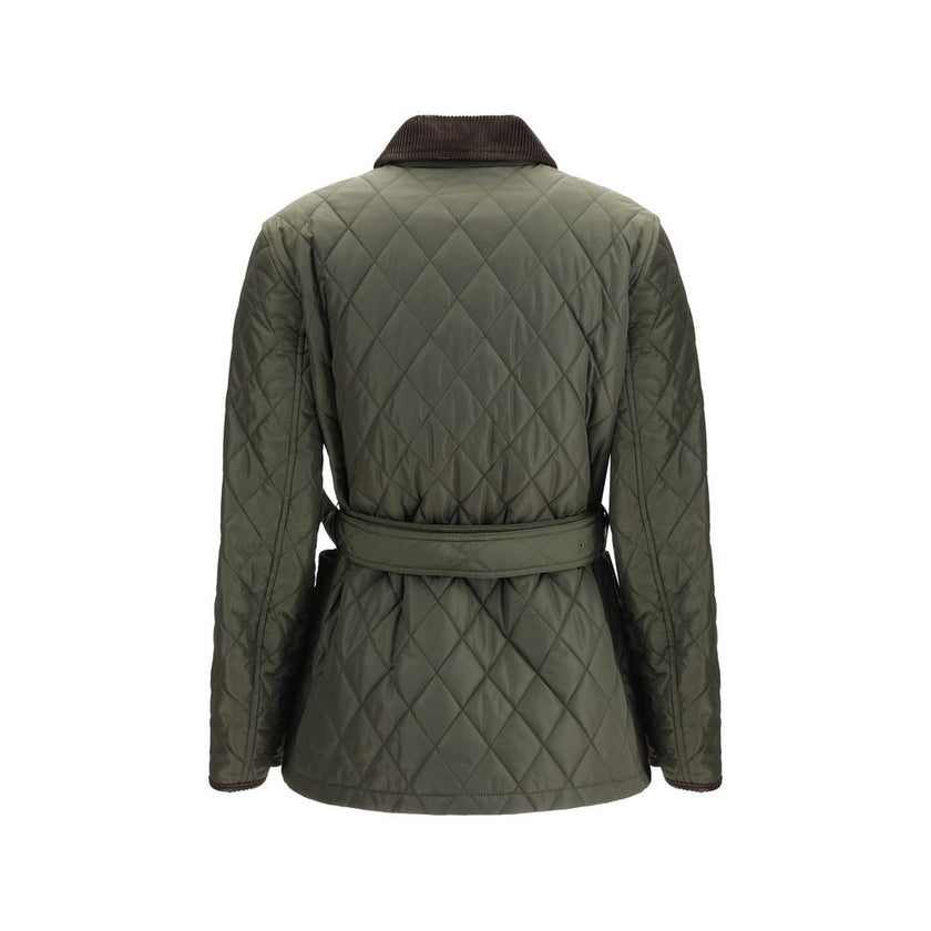 Green Polyamide CoatThe Burberry quilted Jacket is crafted from lightweight Italian-woven nylon, combining functionality with refined style. Featuring a zip and press stud fastening, it is finished with a flattering B-buckle belt. Side patch pockets add p