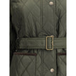 Green Polyamide CoatThe Burberry quilted Jacket is crafted from lightweight Italian-woven nylon, combining functionality with refined style. Featuring a zip and press stud fastening, it is finished with a flattering B-buckle belt. Side patch pockets add p