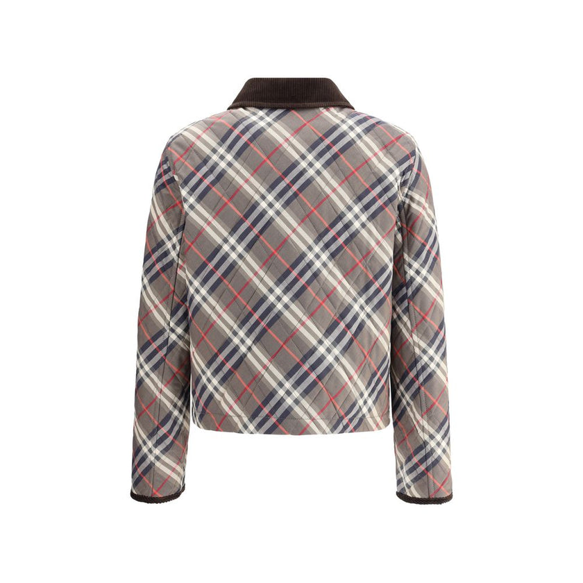 Multicolor Cotton CoatCrafted in England by cotton twill with a Burberry Check motif, the Burberry Quilted Jacket combines elegance and functionality. The cropped, regular-fit model is finished with a corduroy collar and details. Featuring a zip and press