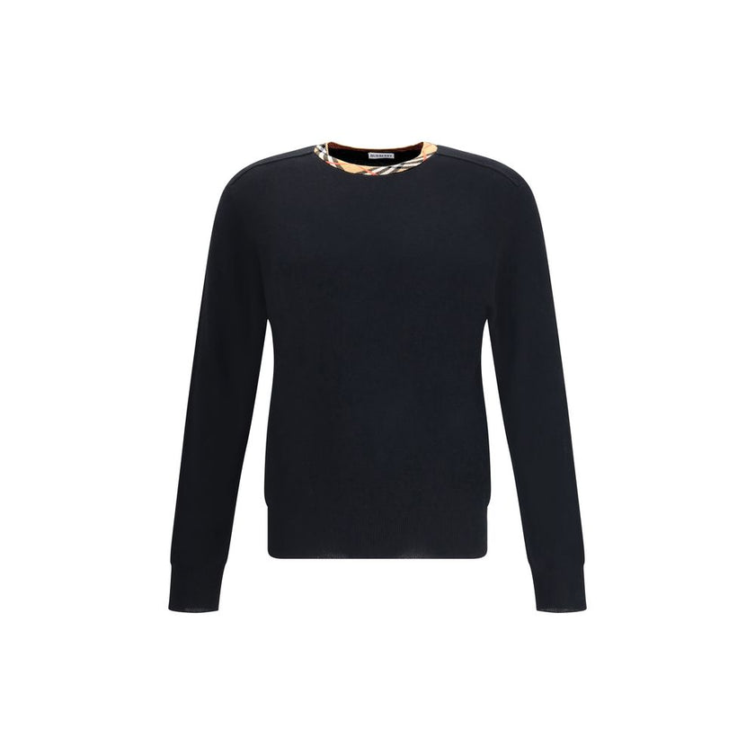 Black Wool SweatshirtThe Burberry Lightweight Wool Sweater is a basic piece with a refined style. The design is enriched by the Burberry Check motif knitted on the collar, in the house’s signature sand tone. The model is completed by the classic ribbed fi