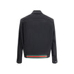 Black Cotton Shell JacketCotton Jacket by Gucci with classic collar and front zip closure. The model features two side welt pockets and adjustable cuffs with a button. The iconic multicolored stripes, a distinctive symbol of the Maison, stand out on the b