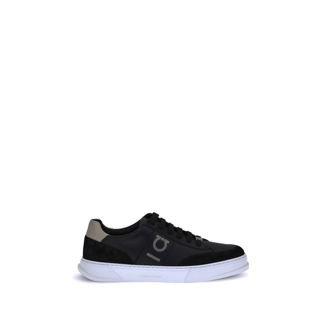 Black Calf Leather Bos Taurus Low Top SneakersFerragamo Sneakers offer a refined reinterpretation of the classic low sneaker. Crafted with a leather upper and tone-on-tone suede profiles, they stand out for the Gancini detail on the side, an iconic symbol