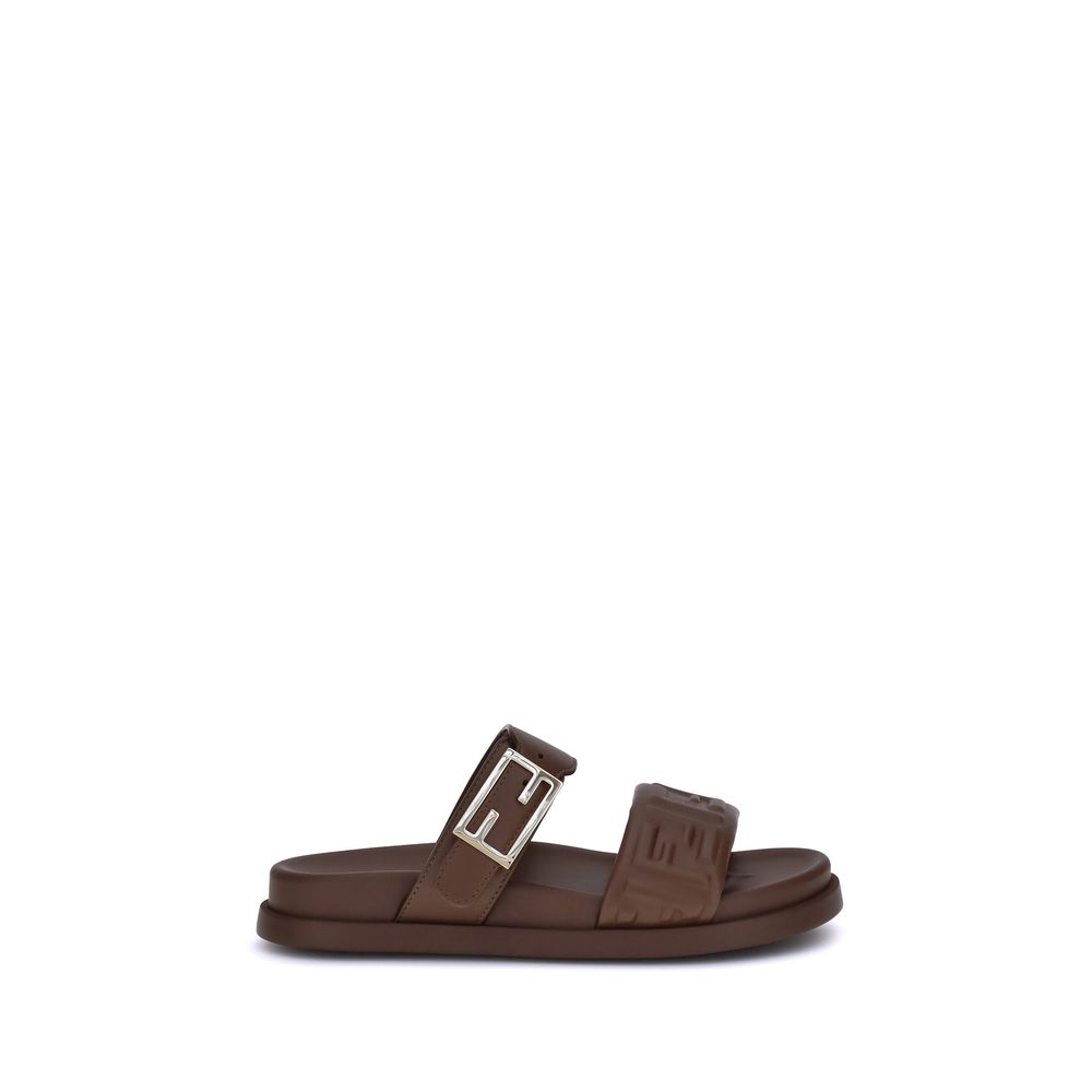 Brown Calf Leather Bos Taurus Flat SandalsLeather Sandals with FF detail by Fendi, a perfect combination of iconic style and everyday comfort. The design is defined by a double front band embellished with the embossed FF motif, the unmistakable symbol of